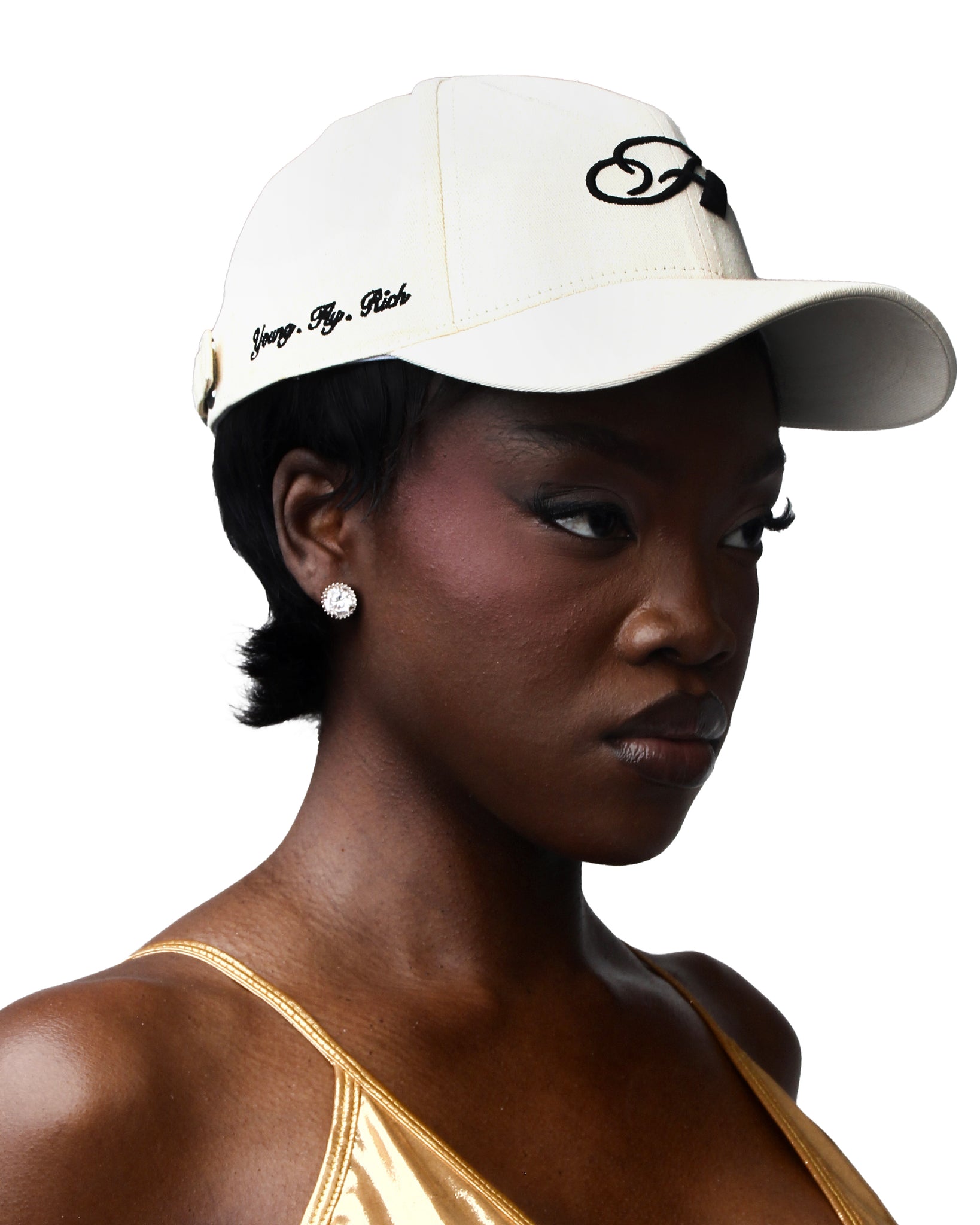 Stylish cream cap made of soft cotton, showcasing a branded logo upfront.